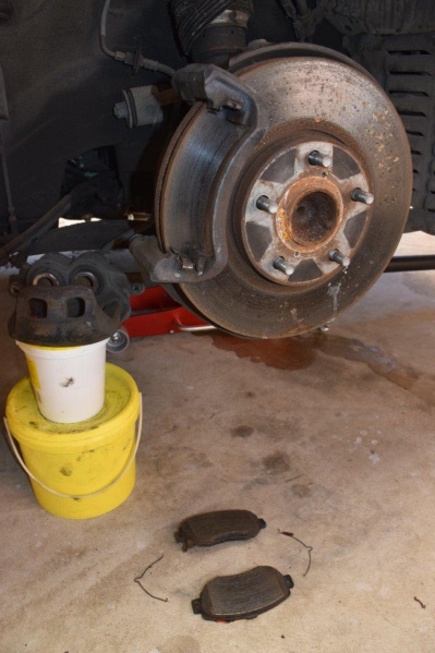 File:Brake pads fully removed.jpg