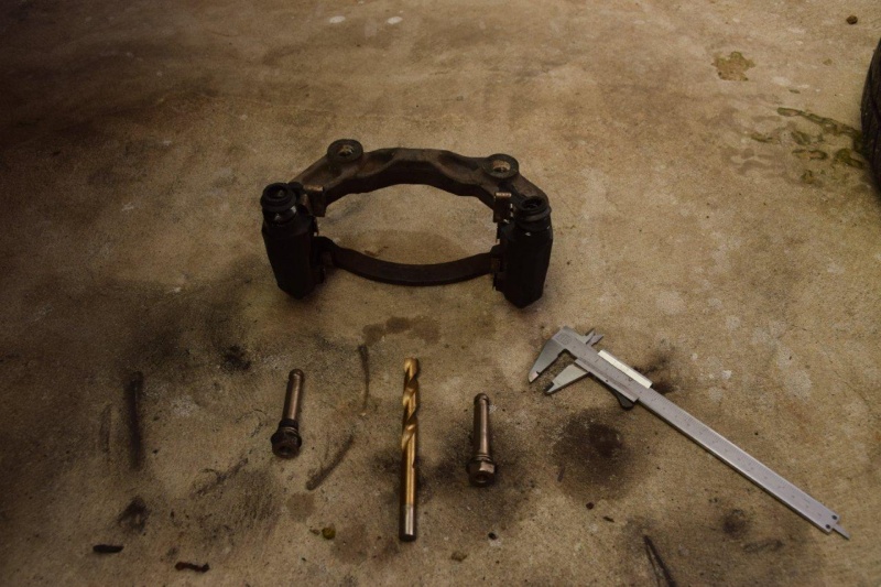 File:Cleaning the calper pin holes.jpg