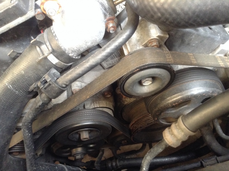 File:Serpentine belt tensioner pulley.jpg